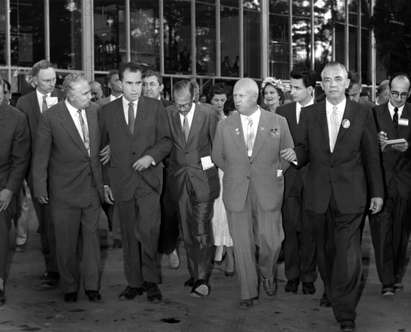 U.S. Vice President Richard Nixon and wife Pat Nixon (background center-right wearing hat) with Soviet Premier Nikita Khrushchev, and others walking in Sokolniki Park before touring American National Exhibition, Moscow, Soviet Union, Richard Nixon Foundation Collection, July 24, 1959