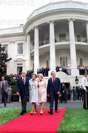 U.S. President Richard Nixon, U.S. First Lady Pat Nixon, U.S. Vice President Gerald Ford, and U.S. Second Lady Betty Ford walking from White House to President's Helicopter, Washington, D.C., USA, August 9, 1974