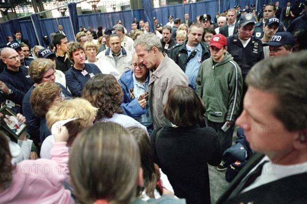 U.S. President George W. Bush meeting with families of missing and deceased emergency service workers related to World Trade Center disaster, Jacob K. Javits Convention Center, Manhattan, New York City, New York, USA, Eric Draper, George W. Bush White House Photo Office, September 14, 2001