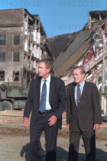 U.S. President George W. Bush and U.S. Secretary of Defense Donald Rumsfeld visiting Pentagon near crash site of American Airlines Flight 77, Arlington County, Virginia, USA, Paul Morse, George W. Bush White House Photo Office, September 12, 2001