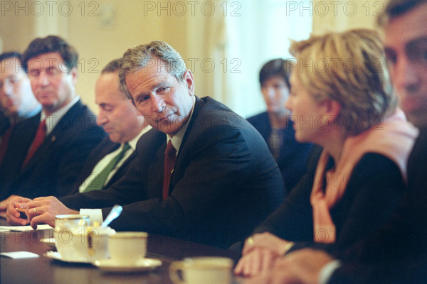 U.S. President George W. Bush meeting with members of congress from states impacted by September 11th terrorist attacks, U.S. Senators from New York Chuck Schumer and Hillary Clinton sit on either side of the President, White House Cabinet Room, Washington, D.C., USA, Paul Morse, George W. Bush White House Photo Office, September 13, 2001