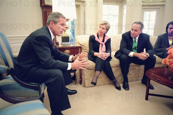 U.S. President George W. Bush meeting with and members of congress from states impacted by September 11th terrorist attacks including U.S. Senators from New York Hillary Rodham Clinton, Chuck Schumer, and National Security Advisor Condoleezza Rice White House Oval Office, Washington, D.C., USA, Eric Draper, George W. Bush White House Photo Office