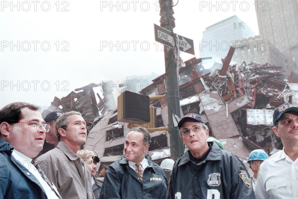 U.S. President George W. Bush, New York Congressman Jerrold Nadler, New York Governor George Pataki, U.S. Senator from New York Hillary Clinton, U.S. Senator from New York Chuck Schumer and New York City Mayor Rudolph Giuliani at World Trade Center disaster site, Financial District, Manhattan, New York City, New York, USA, Eric Draper, George W. Bush White House Photo Office, September 14, 2001