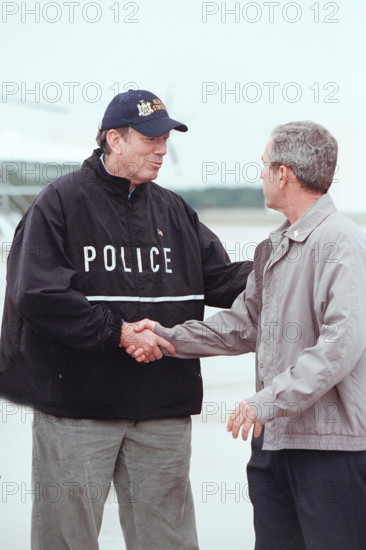 New York Governor George Pataki greeting U.S. President George W. Bush upon his arrival at McGuire Air Force Base, Wrightstown, New Jersey, USA, Paul Morse, George W. Bush White House Photo Office, September 14, 2001