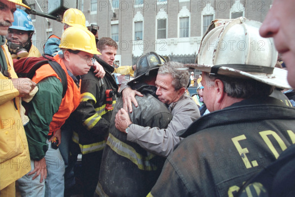 U.S. President George W. Bush embracing firefighter at World Trade Center disaster site, Financial District, Manhattan, New York City, New York, USA, Paul Morse, George W. Bush White House Photo Office, September 14, 2001