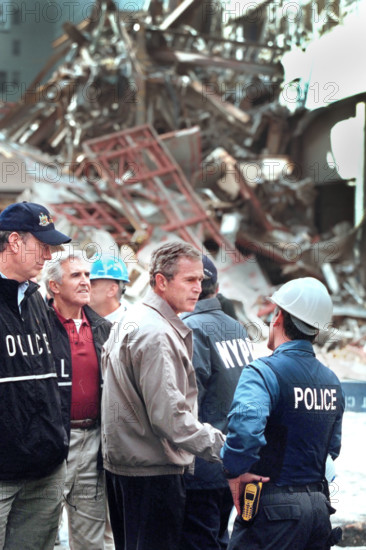 U.S. President George W. Bush touring World Trade Center disaster site with New York Governor George Pataki, Financial District, Manhattan, New York City, New York, USA, Paul Morse, George W. Bush White House Photo Office, September 14, 2001