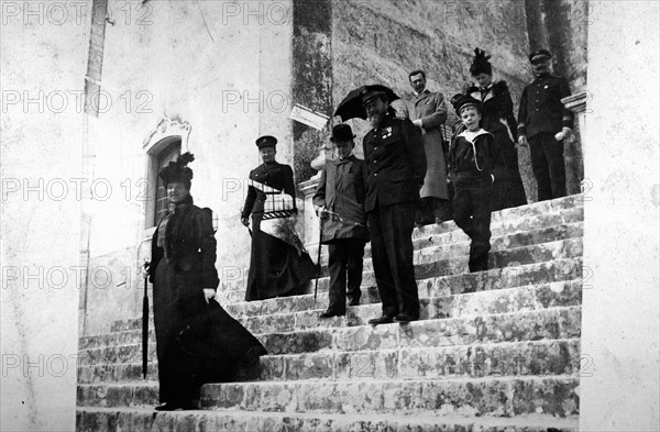 Queen Amélie of Portugal followed by her brother, the Duke of Orléans, and her sons, Princes Louis-Philippe and  Manuel, future Manuel II of Portugal