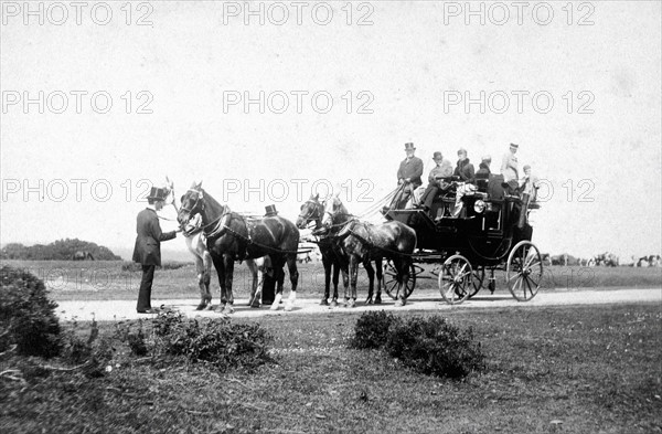 The Count of Paris and the Duke of Chartres and other members of their family in a coach