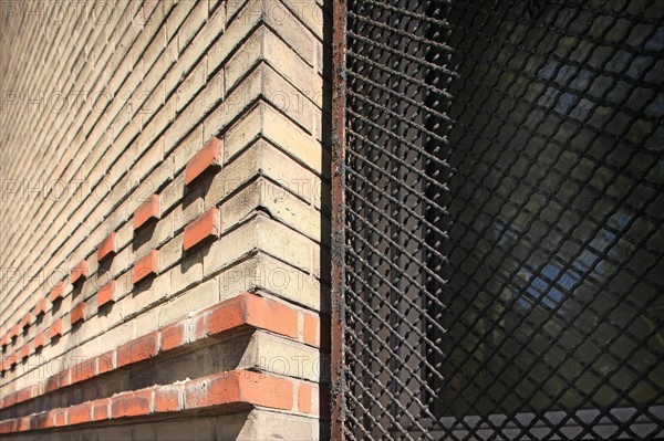 France, Detail of the school facade de la tombe issoire