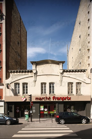 France, Small building surrounded by two others higher