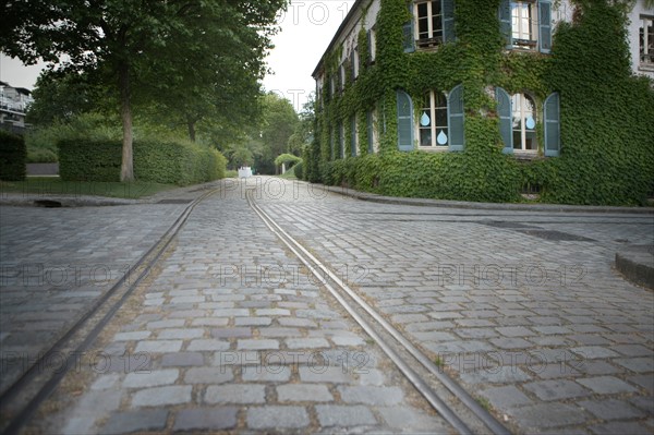 France, ile de france, paris, 12e arrondissement, bercy, parc de bercy, maison du jardinage, jardins potagers, rails chemin de fer
Date : 2011-2012