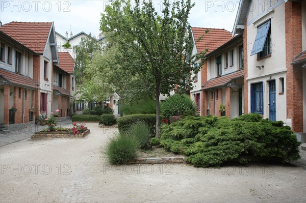 France, ile de france, paris, 13e arrondissement, rue daviel, la petite alsace maisons individuelles avec jardin,  la butte aux cailles,


Date : 2011-2012