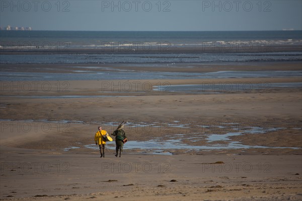 Le Touquet Paris Plage, fishermen in yellow oilskins