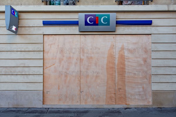 Paris, windows of a bank protected with sealed wood panels