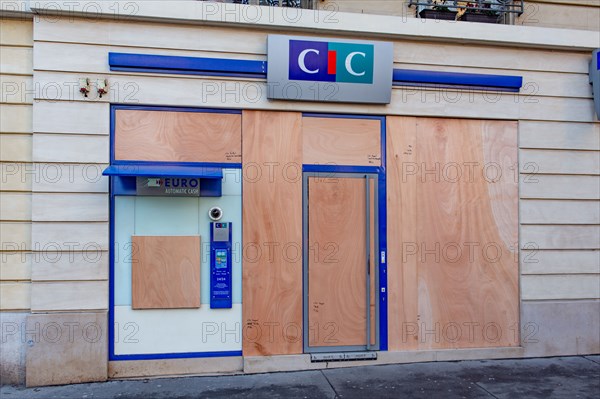 Paris, windows of a bank protected with sealed wood panels