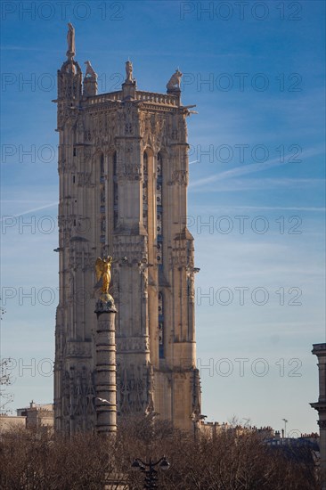 Paris, Saint-Jacques Tower and the column of the Fontaine du Palmier on the Place du Châtelet,