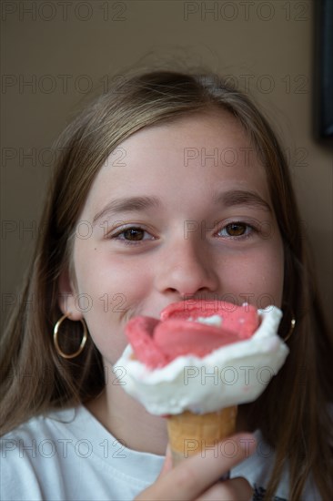 Teenager eating an ice cream