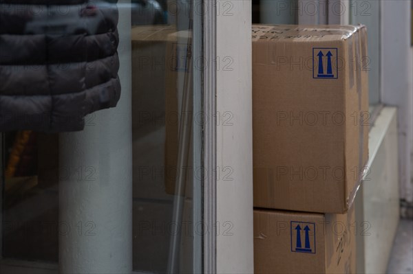 Paris, cardboard boxes in front of a shop rue Sedaine