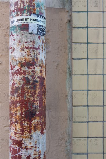 Paris, rusty rainwater downpipe