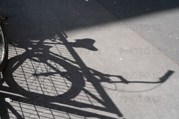Paris, projected shadow of a bicycle