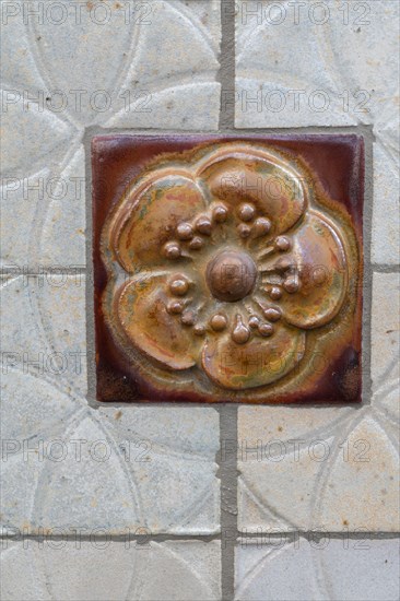 Paris, detail of a decorative motif on a building located rue Campagne Première