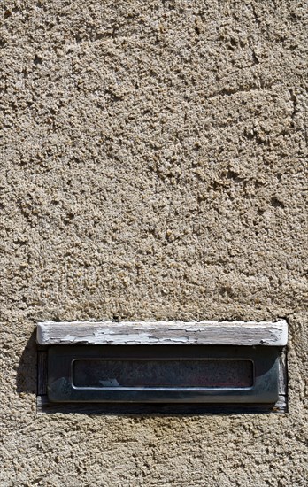 Letter box in a wall