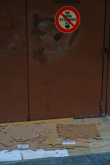 Paris, cardboard boxes in front of a garage door