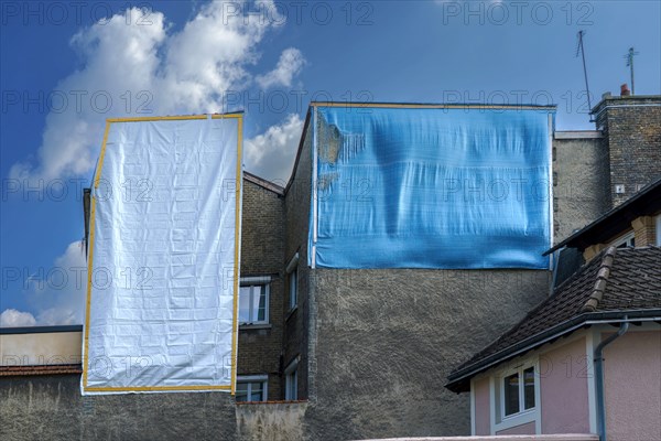 Tarpaulins on gables