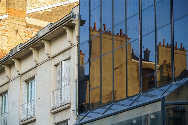 Reims, reflection in a building facade