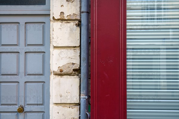 Reims, closed shop and building door