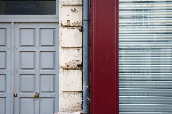 Reims, closed shop and building door