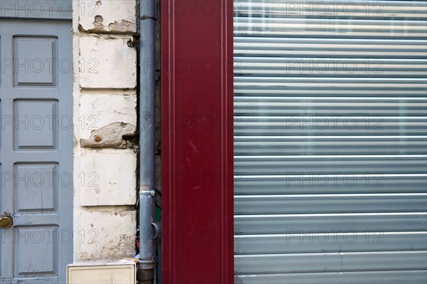 Reims, closed shop and building door