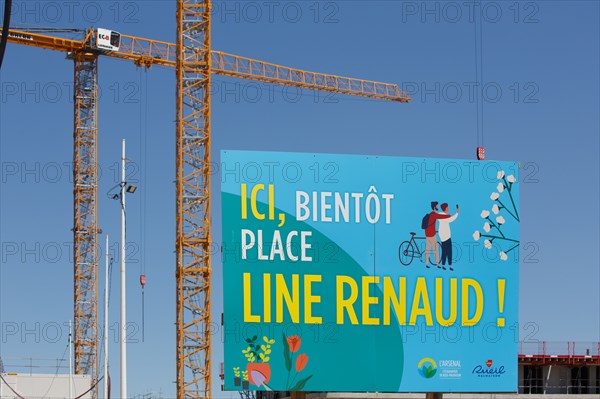 Construction cranes in the J. Chirac park in Rueil Malmaison