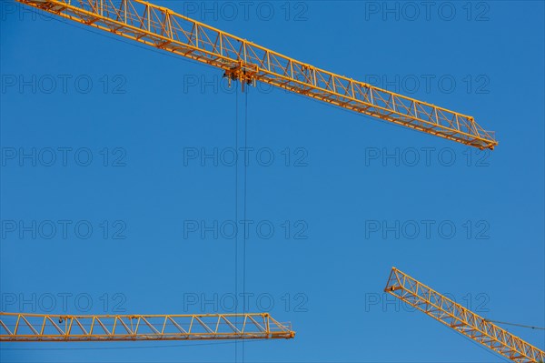 Construction cranes in the J. Chirac park in Rueil Malmaison