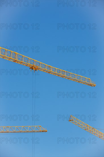 Construction cranes in the J. Chirac park in Rueil Malmaison