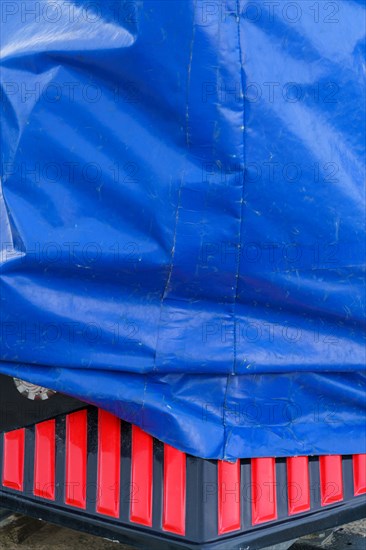 Trouville, small fairground train under a tarpaulin