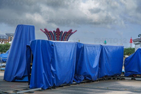 Trouville, small fairground train under a tarpaulin