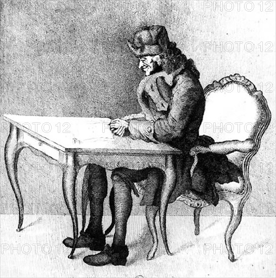 Voltaire at his work table