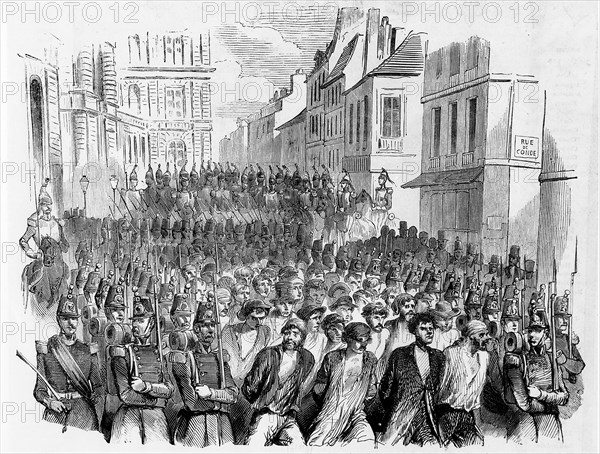 Passage of a column of captive insurrectionists through Paris -