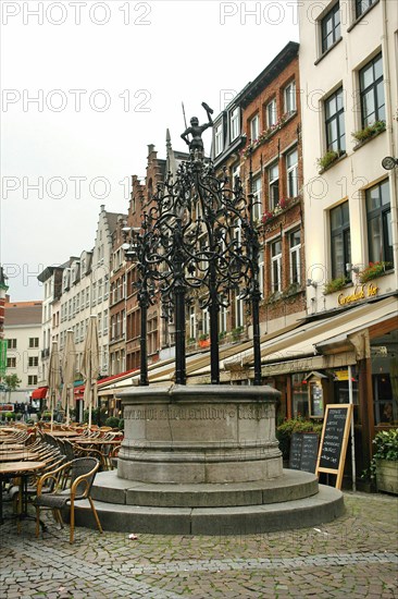 Stone well with decorative forged iron.