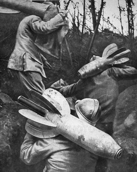 A man carries a shell on his back.