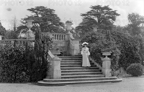 Woman posing at Park Place, Remenham, Berkshire, c1900