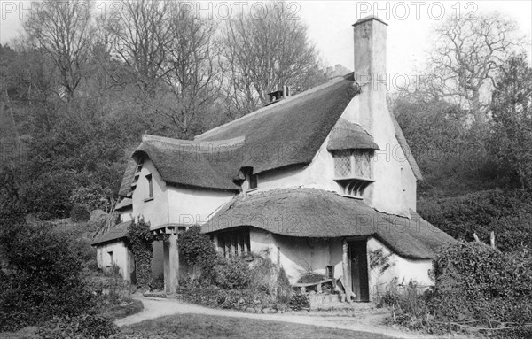 A thatched cottage at Selworthy Green, Selworthy, Somerset, c1900