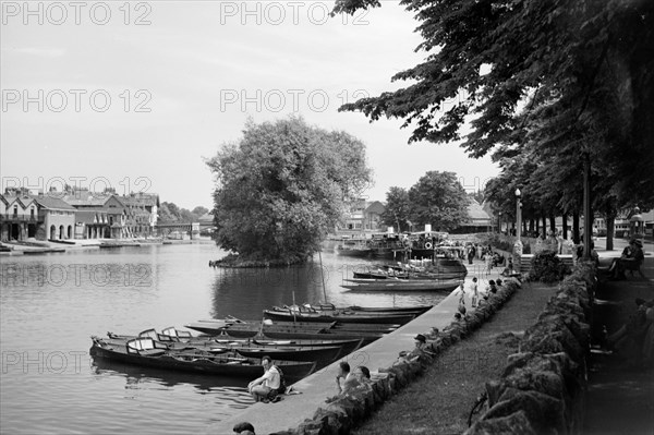 People enjoying a day beside the River Thames at Windsor, Berkshire, c1945-c1965