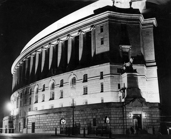 Unilever House floodlit at night, London, c1932