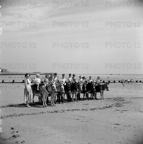 Donkey rides on the beach, Bridlington, East Riding of Yorkshire, 1950s