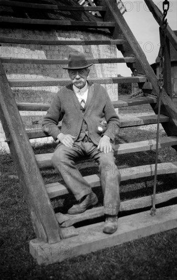 Miller outside his windmill, Outwood, Surrey, 1933