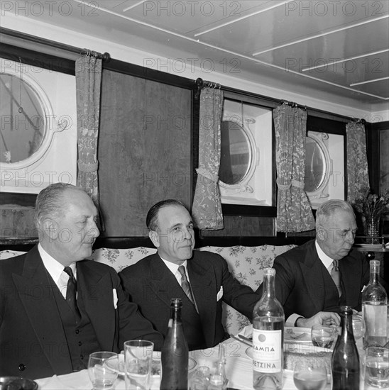 Group of men dining on board a ship, 1945