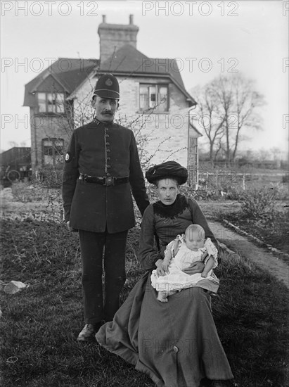 A group portrait of a policeman and his family, Warwickshire, 1905
