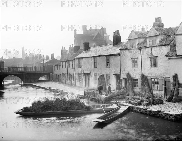 Abel Beesley, Oxford University waterman, and his rush punt, Fisher Row, Oxford, c1860-c1922